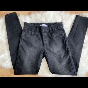 Stretchy black skinny jeans with elastic waist